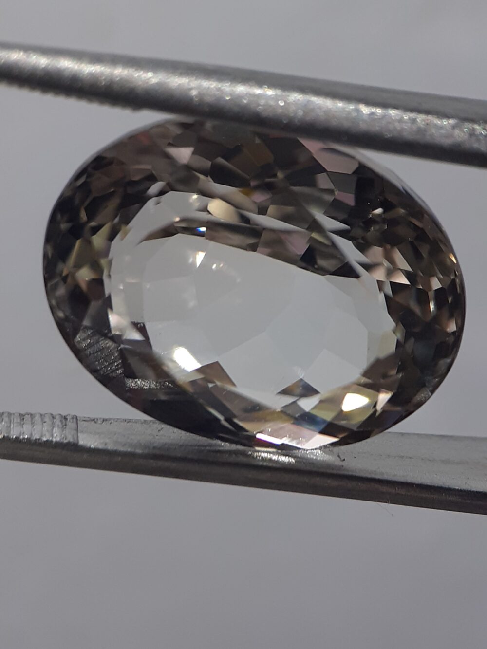 20240607_192057 Natural Greenish Yellow Topaz · 15.1 ct · Oval · Mixed Cut · unheated · Brazil