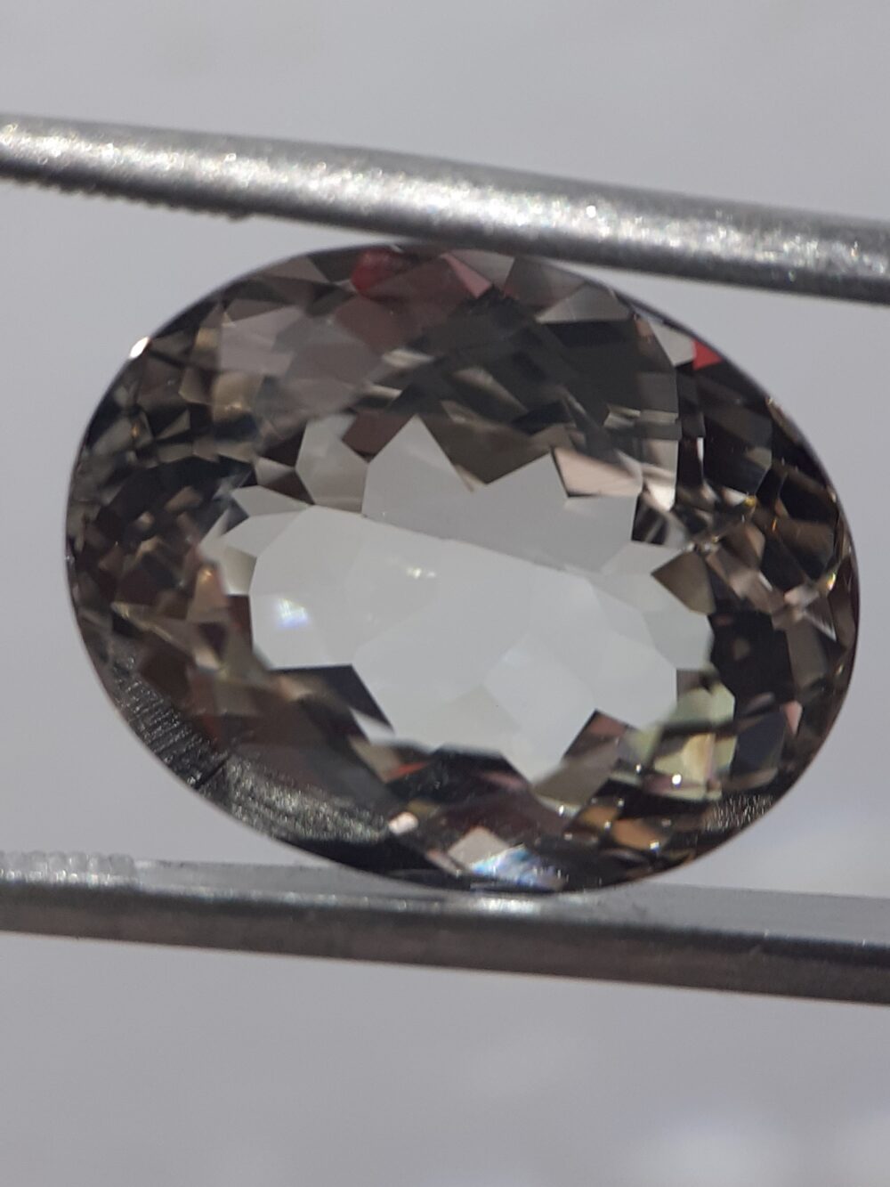 20240607_192103 Natural Greenish Yellow Topaz · 15.1 ct · Oval · Mixed Cut · unheated · Brazil